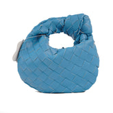 Mini sac à main en forme de croissant fait à la main avec du matériel doré